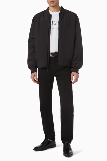 تي شيرت مزين بشعار الماركة قطن