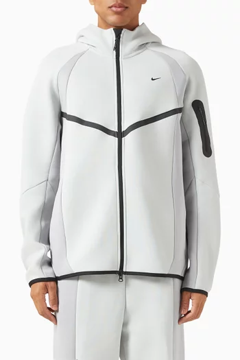 جاكيت بتصميم مقسم بألوان وسحّاب صوف