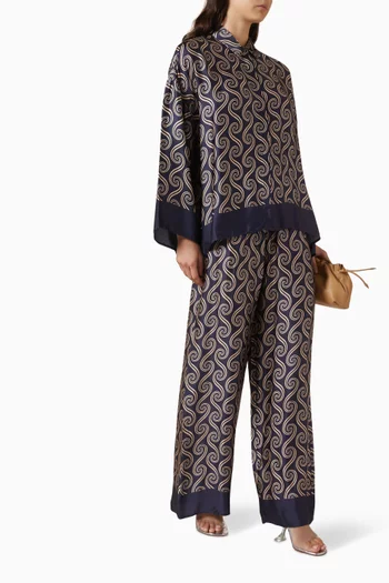 بنطال جنسن بقصة ساق واسعة ستان