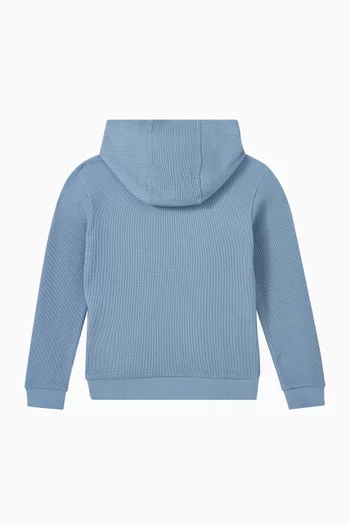 كنزة بغطاء رأس بشعار الماركة