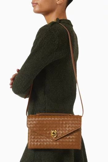 حقيبة كروس بقفل على شكل عقدة جلد بيكولو مجدول