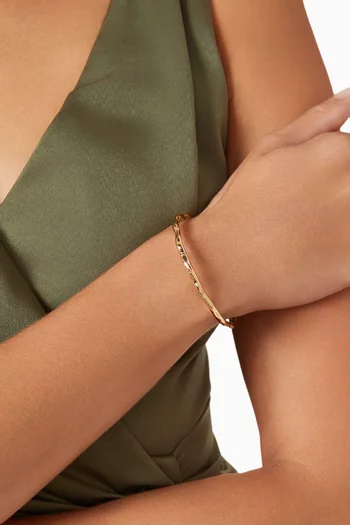 سوار بتصميم انسيابي نحاس مطلي بالذهب عيار 18