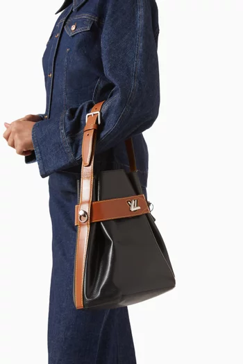 حقيبة باكيت بقفل دوار جلد إيبي