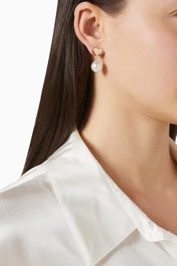 أقراط بتصميم قلب نحاس