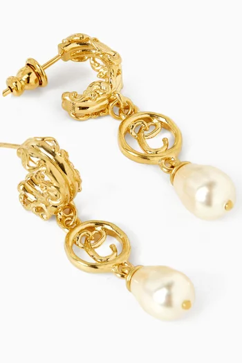 أقراط متدلية مزينة بلؤلؤ نحاس