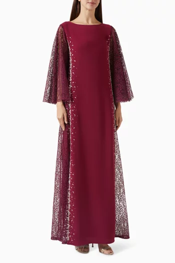 فستان مزين بتطريزات من قماشين