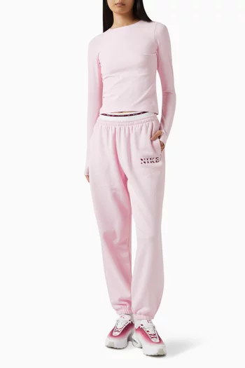 بلوزة بقصة ضيقة وتقنية Dri-FIT‏