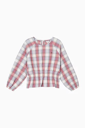 بلوزة بكشكش ونقشة مربعات 