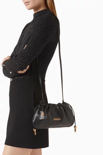 حقيبة كروس ميني بشارة الماركة جلد نابا