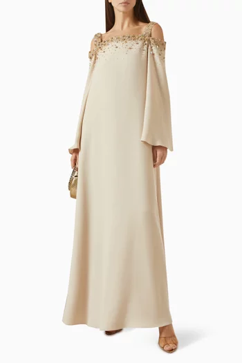 "A timeless off-shoulder silhouettein soft nude beig with flowing sleeves and a graceful floor-length drape.":BEIGE:XL|219069961