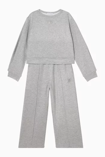 بنطال رياضي بقصة ساق واسعة وشعار الماركة قطن