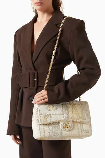 حقيبة جامبو بغطاء قلاب ورقعات بارزة من عقد 2010