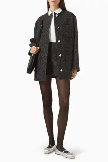 تنورة قصيرة صوف تويد بوتوني بنقشة GG