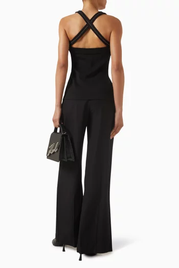 بلوزة بلا أكمام مطرزة بحلي معدنية صغيرة