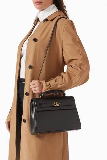 حقيبة كيه/اوتوغراف متوسطة بيد علوية جلد