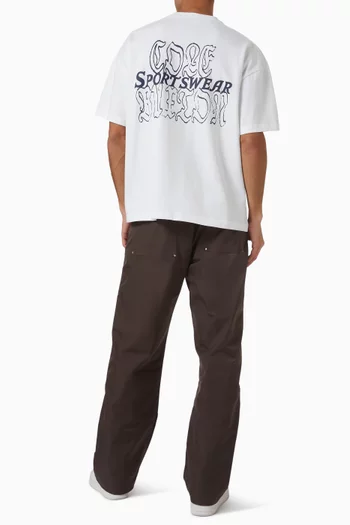 تي شيرت بأحرف الماركة وشعار Sportswear قطن