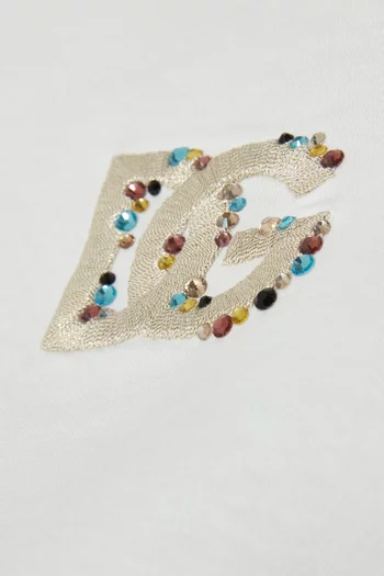 تي شيرت بشعار الماركة مزين بأحجار الراين قطن