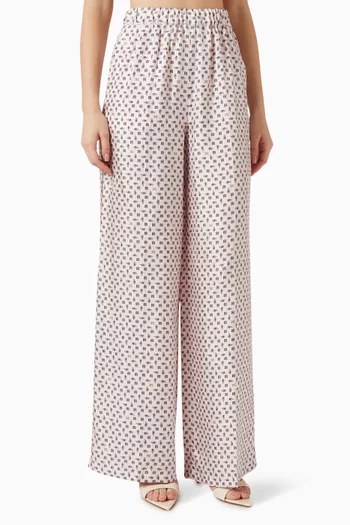 بنطال بقصة ساق واسعة ونقشة حرير وتويل