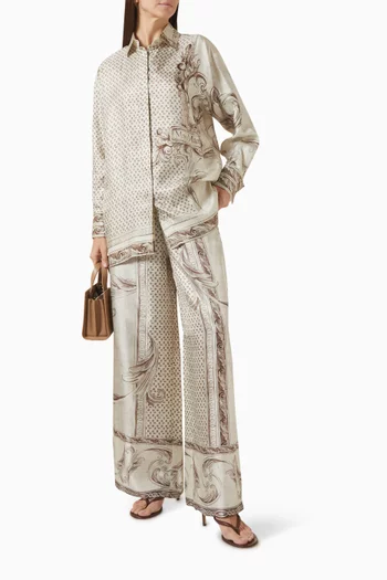 بنطال بقصة ساق واسعة مزين بنقشة