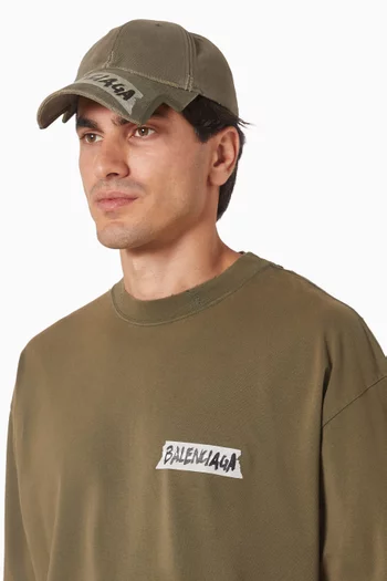 كاب بشريط لاصق بشعار الماركة قطن دريل