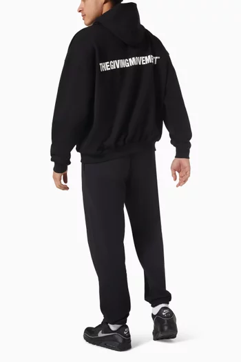 كنزة بغطاء رأس فضفاضة وشعار الماركة قطن