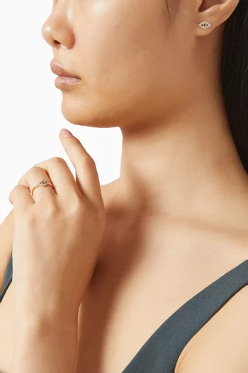 خاتم بتصميم عين الحسود مرصع بالزمرد ذهب أصفر عيار 14