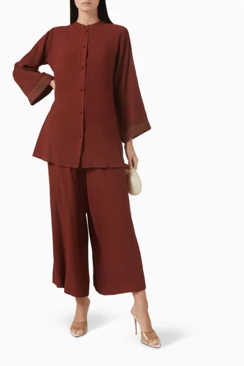 طقم مكون من قميص وبنطال