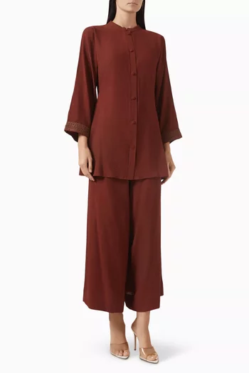 طقم مكون من قميص وبنطال