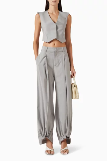 بنطال بأربطة تضييق وطيّات