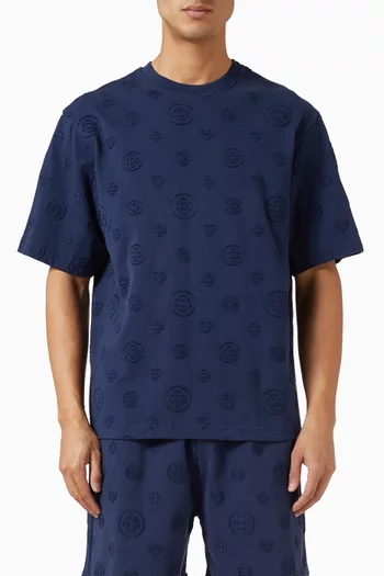 تي شيرت فضفاض برقعات بحروف الماركة قطن عضوي