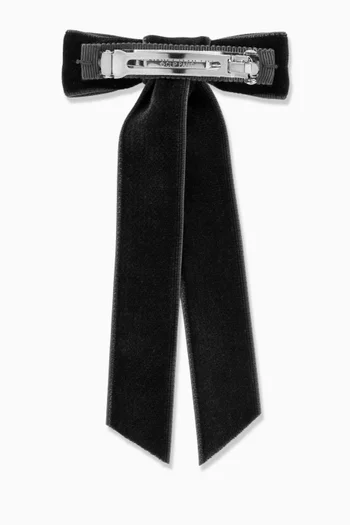 مشبك بتصميم عقدة مخمل