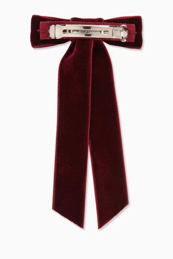 مشبك بتصميم عقدة مخمل