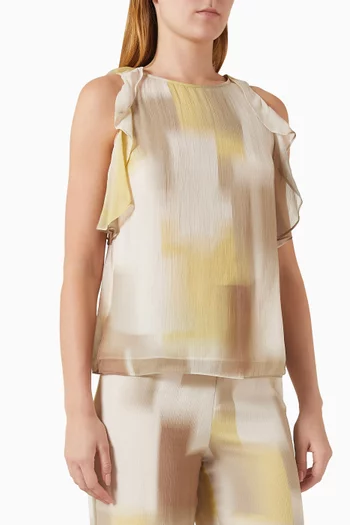 بلوزة بكشكش ونقشة