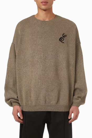 سترة بنسيج متشابك وفتحة رقبة مستديرة