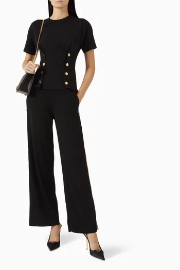 تي شيرت بتصميم مشد وأزرار جيرسيه