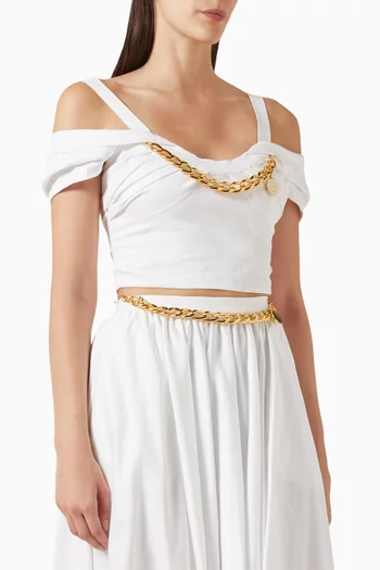 بلوزة قصيرة مزينة بتطريزات قطن مطاطي