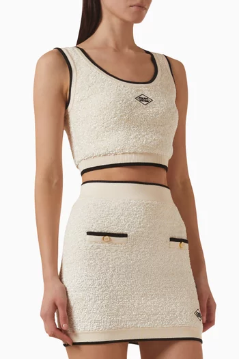 بلوزة قصيرة بشعار الماركة شنيل