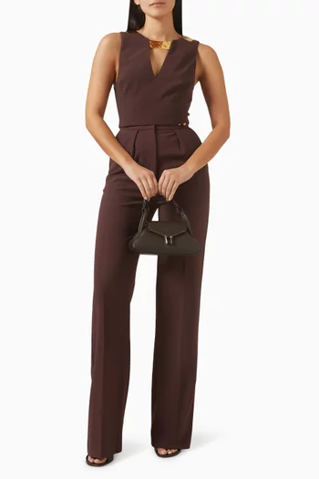 بلوزة بحلية معدنية عند فتحة الرقبة كريب