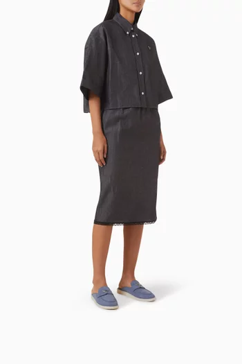 حذاء مفتوح من الخلف بحلية مثلثة بشعار الماركة نوبوك