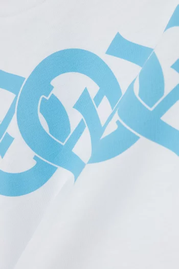 تي شيرت قطن بشعار الماركة بتصميم متقاطع