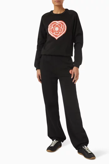 سويت شيرت بنقشة قلب وشعار زهرة بوكي قطن