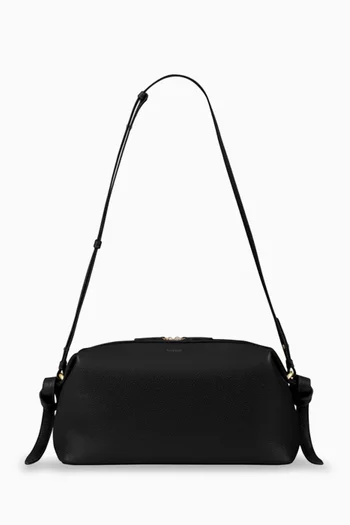 حقيبة صغيرة بريوش جلد بملمس حُبيبي