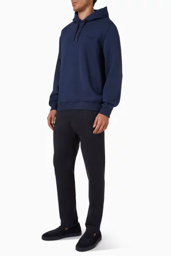 كنزة بغطاء رأس وشعار وجه يبتسم بارز الملمس