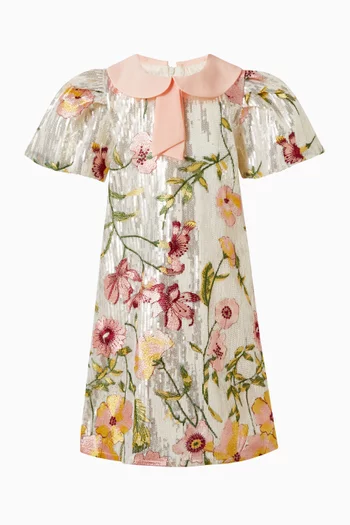JG SS  SEQUIN DRESS WITH FLORAL EMBROIDERY, PLEATED METALLIC SLEEVES, AND A SOFT PINK PETER PAN COLLAR WITH BOW DETAIL:OFF WHITE:4-5Y|219258503