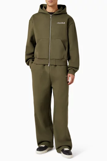 بنطال رياضي بقصة ساق واسعة وشعار الماركة مزيج قطن