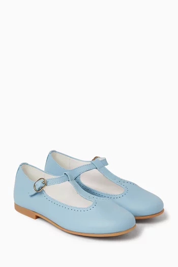 حذاء باليرينا على شكل حرف T وكعب مسطح جلد