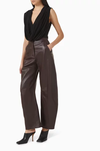 بنطال بتصميم مستدير وخصر منخفض جلد