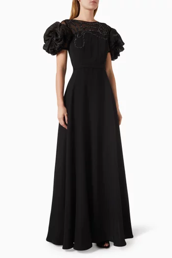 فستان سهرة مزين بتطريزات بالخرز