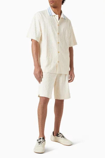 قميص بنقشة شعار الماركة قطن