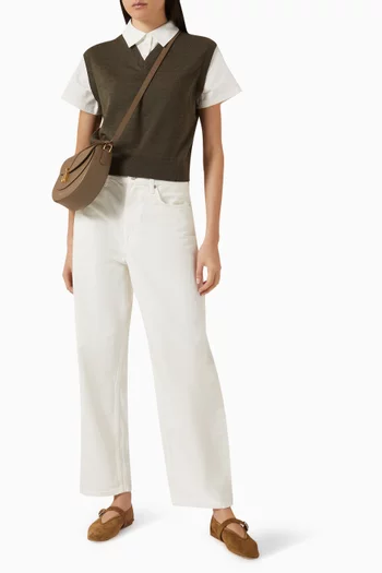 سترة قصرة بفتحة رقبة على شكل حرف V‏